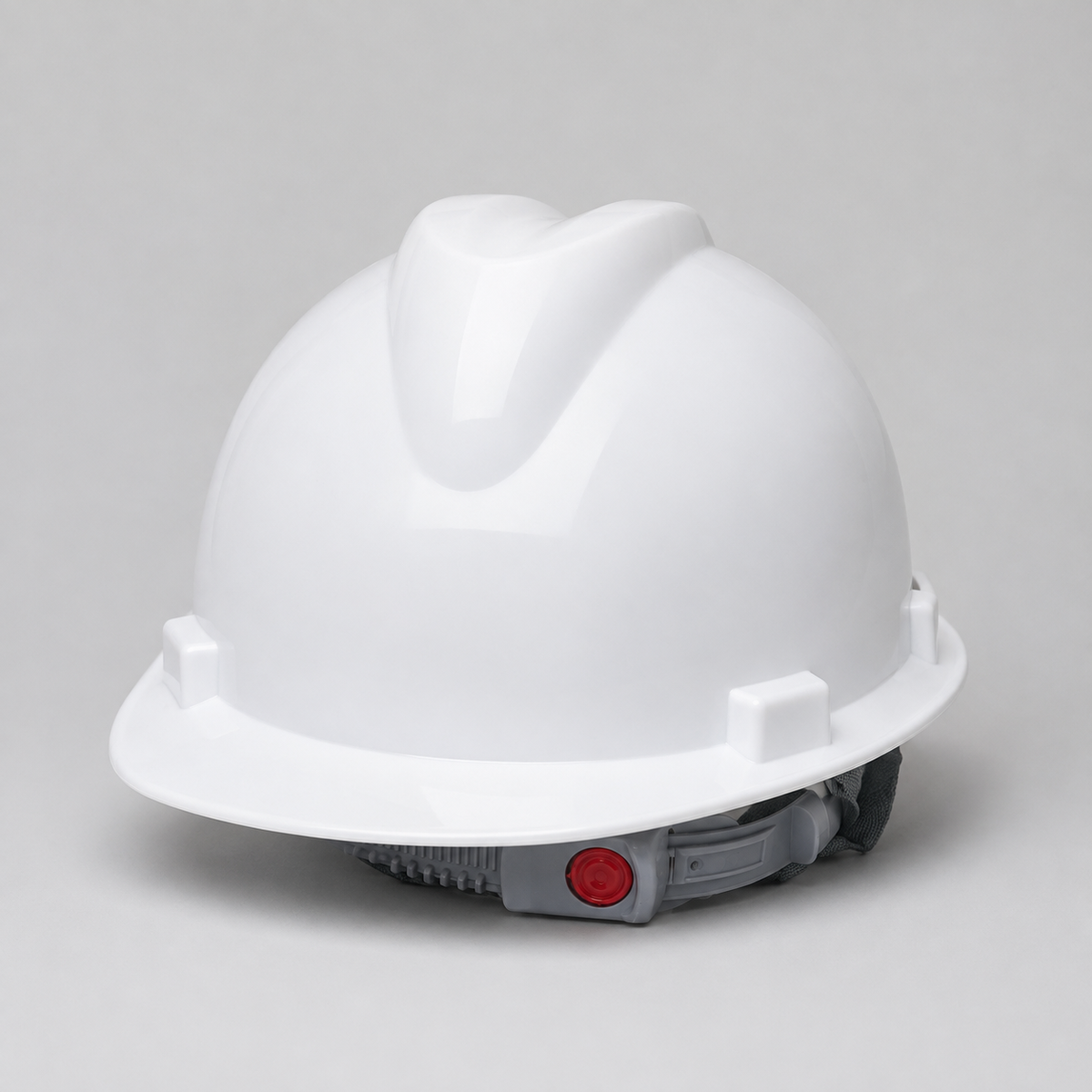 White hard hat with a blank front logo area on a clean studio background